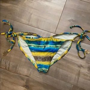 LULI FAMA: Wavey Ruched Back Tie Side Bottoms